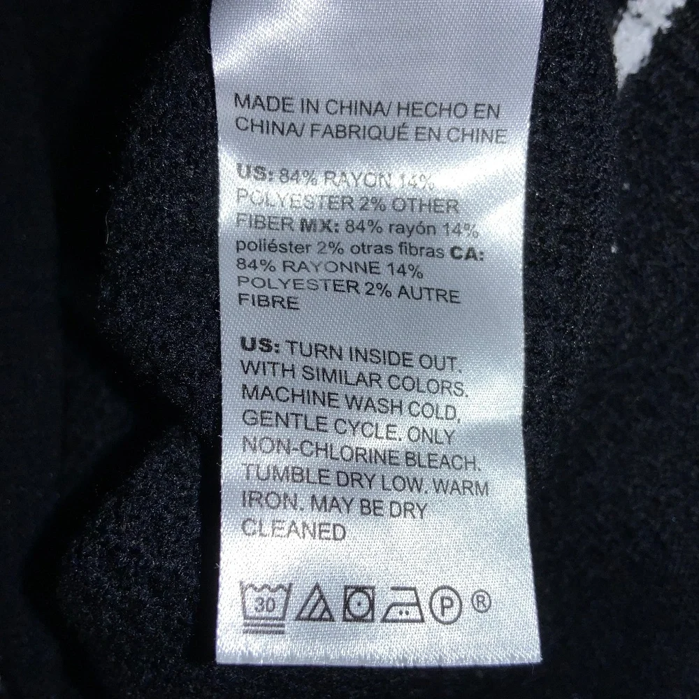Chico’s striped crew neck sweater measures as L soft textured curved hem